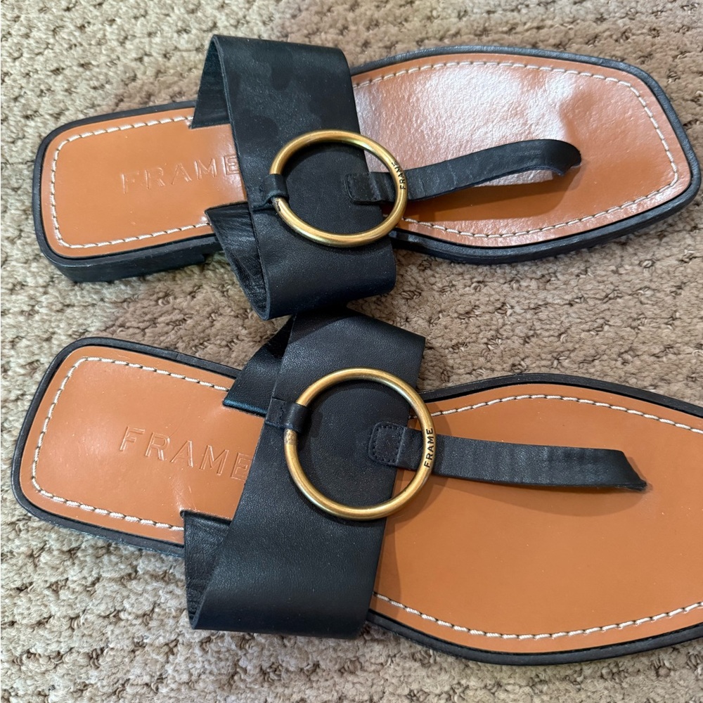 Frame Denim Black Leather Toe-Loop Sandals with Gold Ring